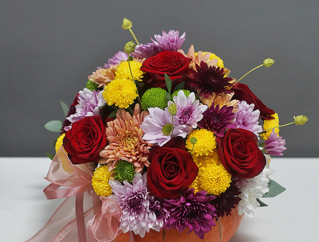 Arrangement with Red Roses and Chrysanthemum in a Pumpkin photo